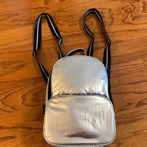 Silver mini backpack perfect for hiking or travels